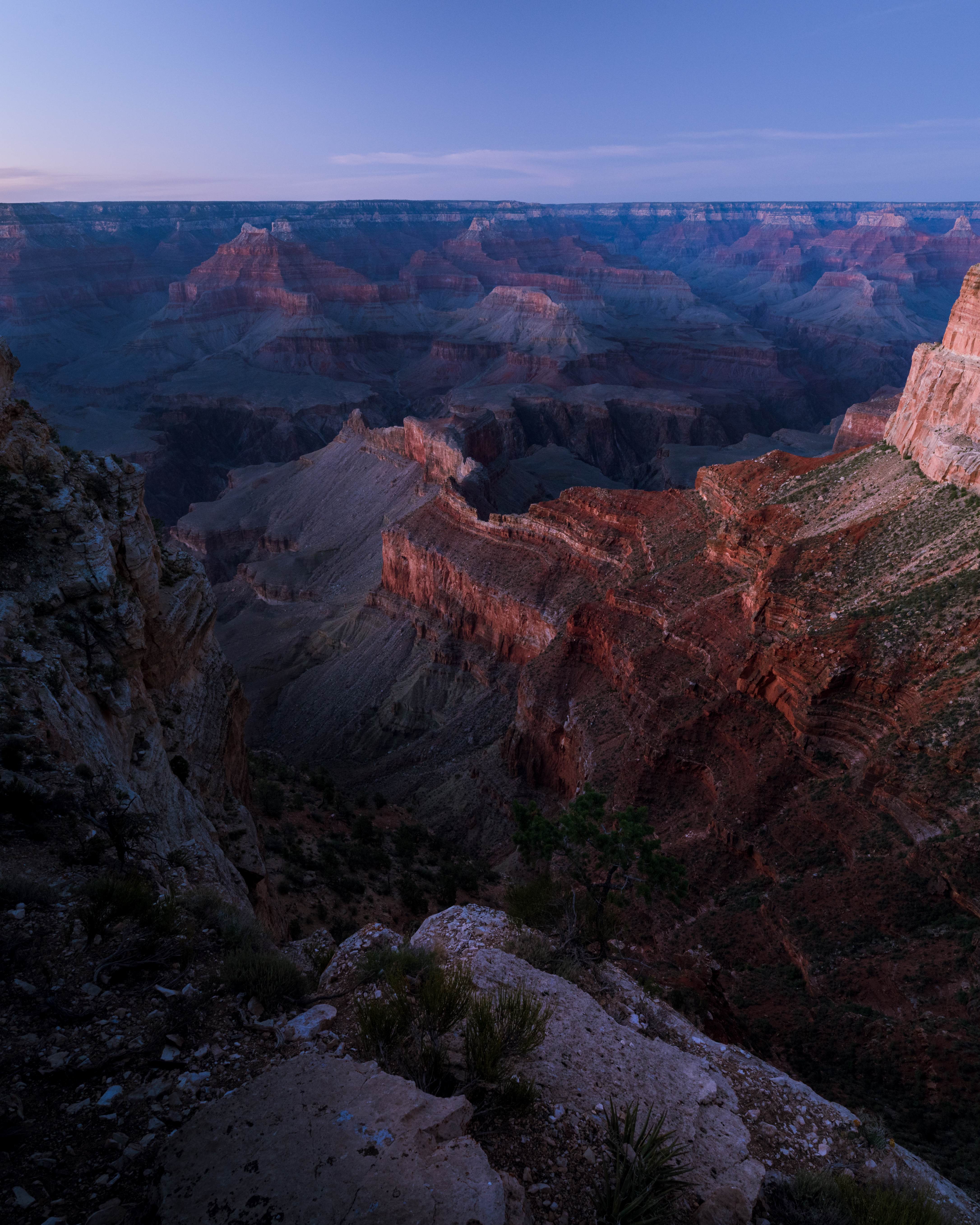 The Grand Canyon at blue hour from Mojave Point, last light on the red buttes fading into cool twilight.